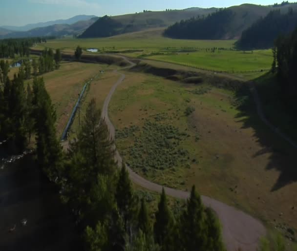 Foto aérea de Green Valley con río — Vídeos de Stock