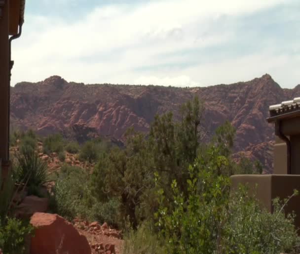 Large desert home in red rock desert — Stock Video