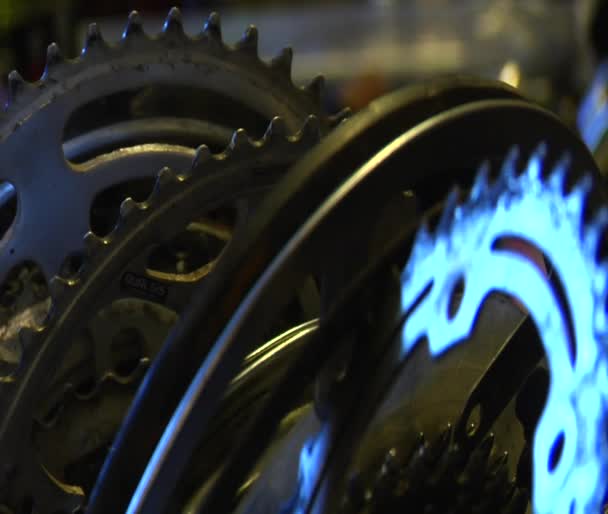 Metal bike parts gleaming in light — Stock Video