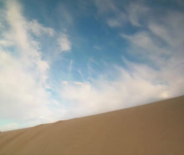 ATV rider jumps sand dune — Stock Video