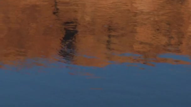 Rock cliffs reflected in water — Stock Video