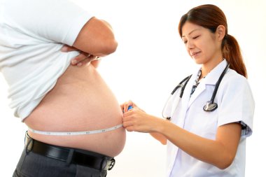 ciddi doktor hasta obezite incelenmesi