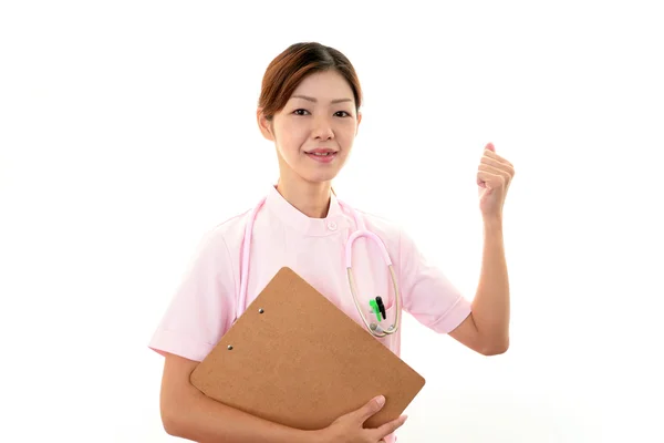 Junge asiatische Krankenschwester — Stockfoto