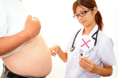 ciddi doktor hasta obezite incelenmesi