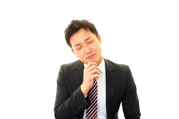 Depressed Asian businessman. — Stock Photo, Image