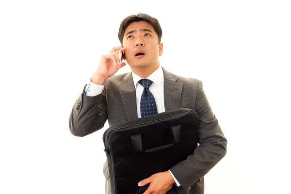 Depressed Asian businessman. — Stock Photo, Image