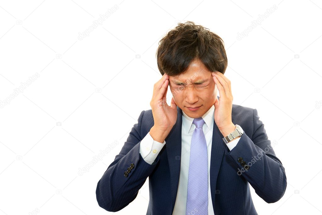 Businessman having a headache