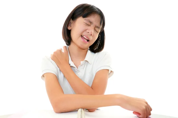 Menina com dor no ombro — Fotografia de Stock
