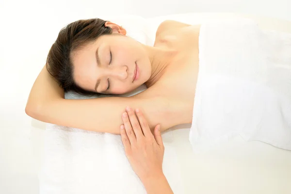 Young woman in Spa getting hair removal — Stock Photo, Image