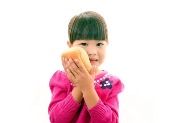 持有一个面包的小女孩 — 图库照片