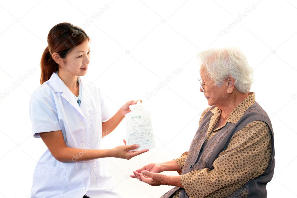 Smiling pharmacist with old woman