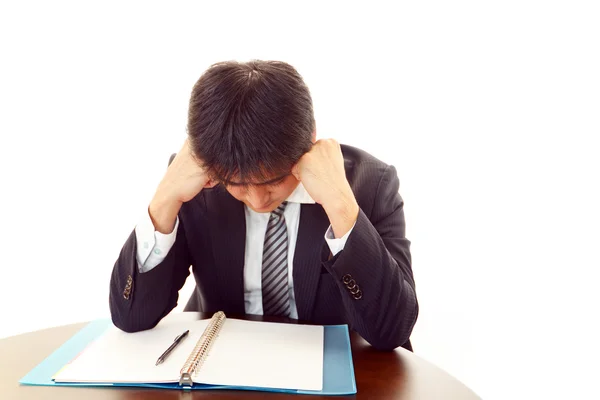 Depressed Asian businessman. — Stock Photo, Image