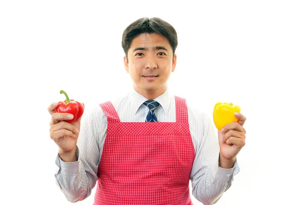 Muž, který držel zelenina — Stock fotografie
