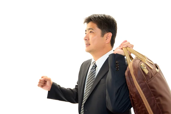 Asian businessman with bag — Stock Photo, Image