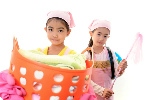 Child carrying laundry basket — Stock Photo, Image