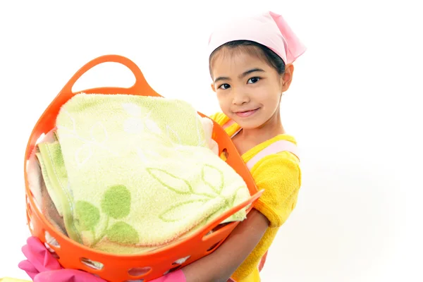 Child carrying laundry basket — Stock Photo, Image