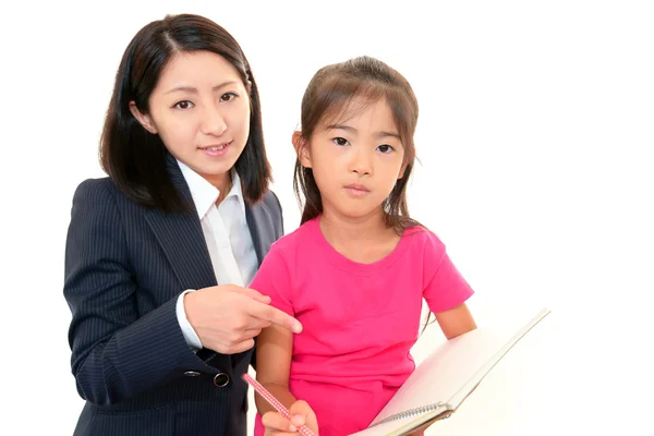Teacher with girl studying. — Stock Photo, Image