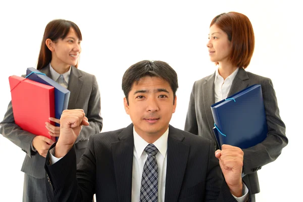 Smiling businessman and businesswoman — Stock Photo, Image