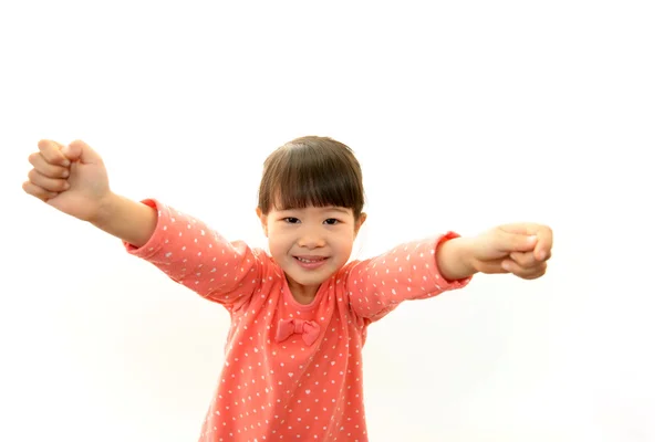 Menina asiática feliz sorriso em seu rosto — Fotografia de Stock