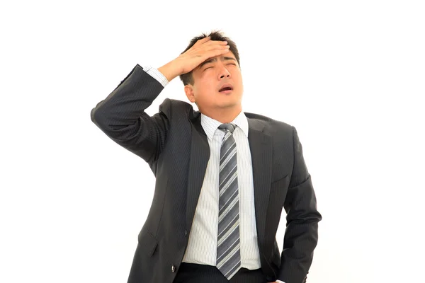 Businessman having a headache — Stock Photo, Image