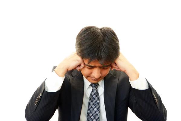 Depressiver asiatischer Geschäftsmann. — Stockfoto