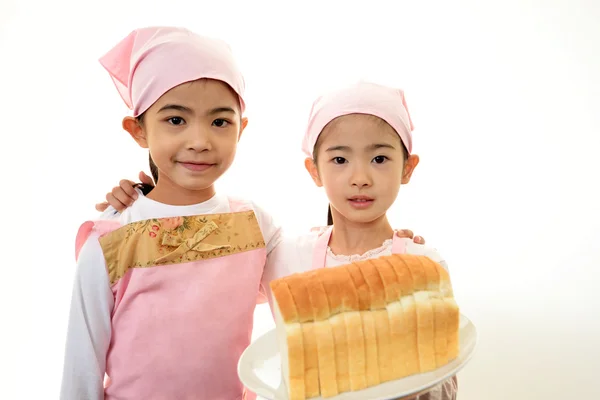 Girls with bread — Stock Photo, Image