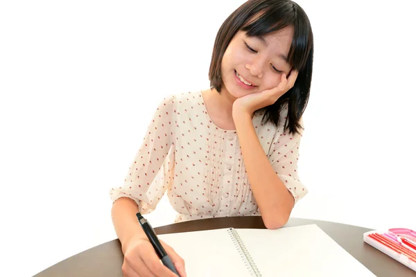 Sorrindo menina estudando — Fotografia de Stock