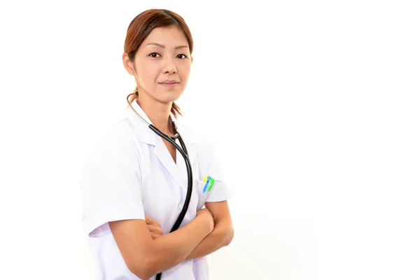 Sorridente medico asiatico — Foto Stock