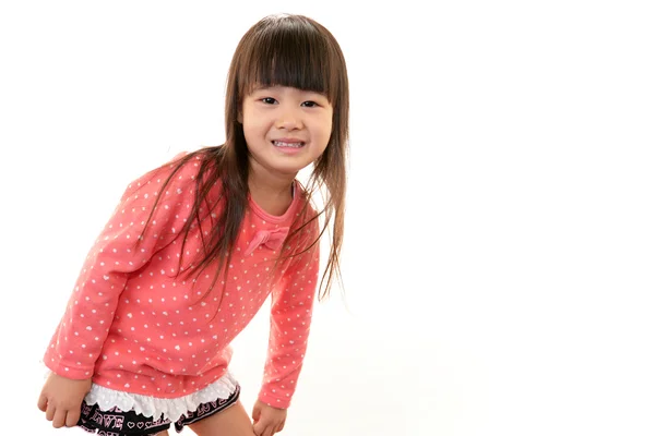 Feliz chica asiática sonrisa en su cara — Foto de Stock