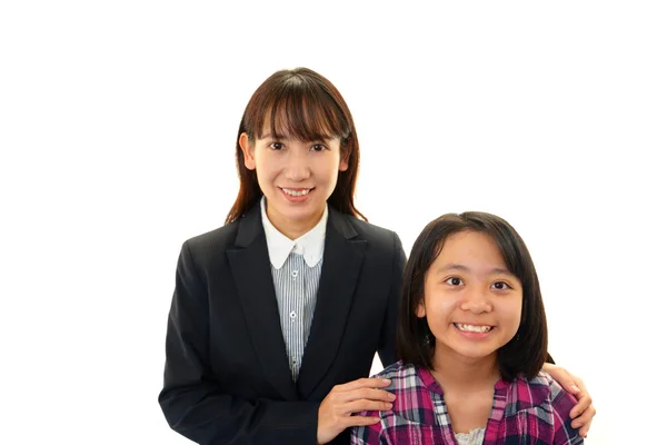 Smiling teacher with girl — Stock Photo, Image