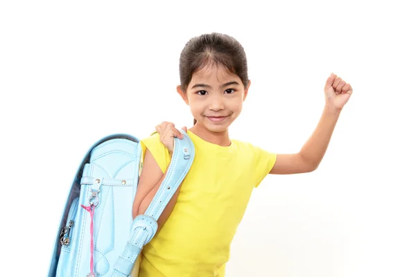 Menina sorridente com mochila — Fotografia de Stock