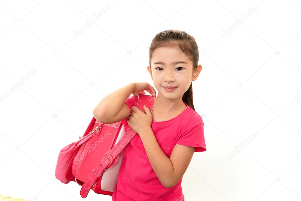 Smiling Asian schoolgirl