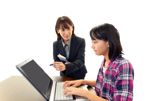 Profesora con chica estudiando . —  Fotos de Stock