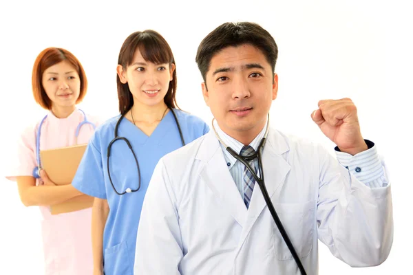 Sorridente personale medico asiatico — Foto Stock