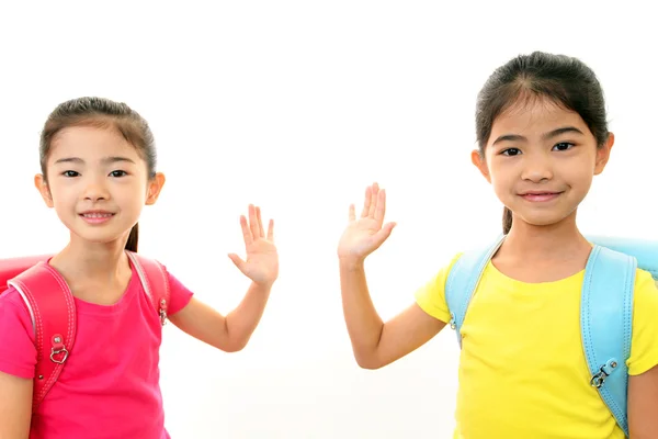 Smiling Asian schoolgirls — Stock Photo, Image