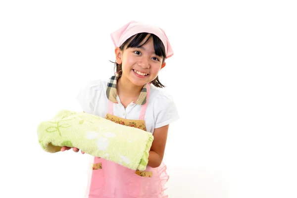 Child is holding a laundry — Stock Photo, Image