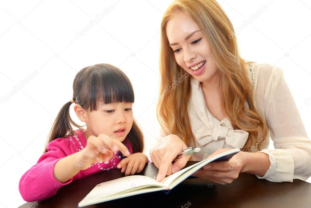 English teacher with girl studying.