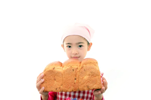 Girl holding a bread — Stock Photo, Image