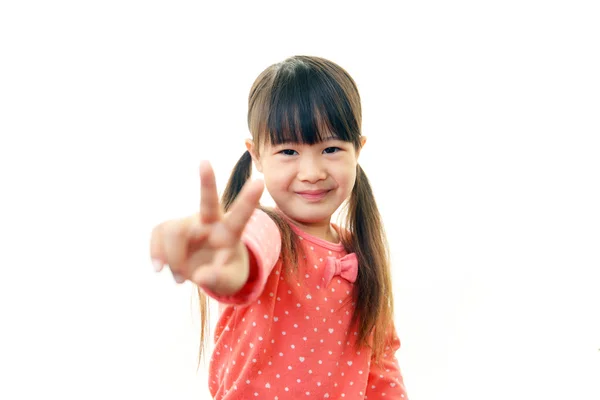 Menina asiática feliz sorriso em seu rosto — Fotografia de Stock