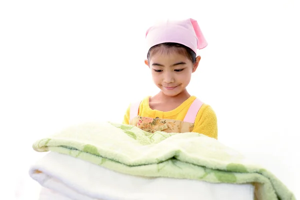 Child is holding laundry — Stock Photo, Image