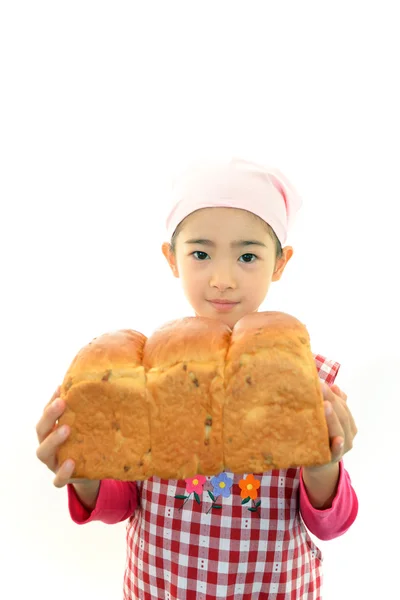 持有一个面包的女孩 — 图库照片