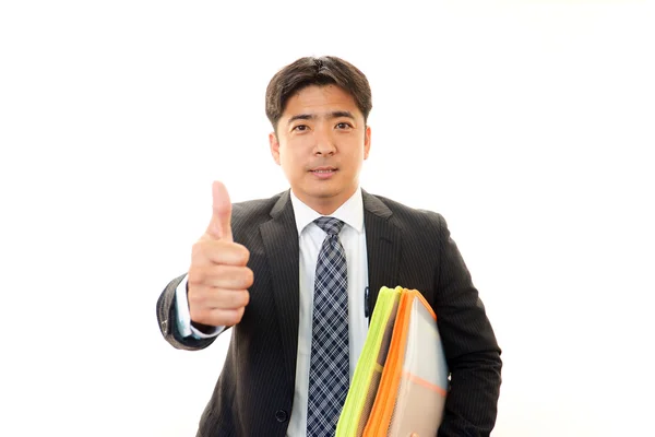 Happy business man showing thumb 's up sign — стоковое фото