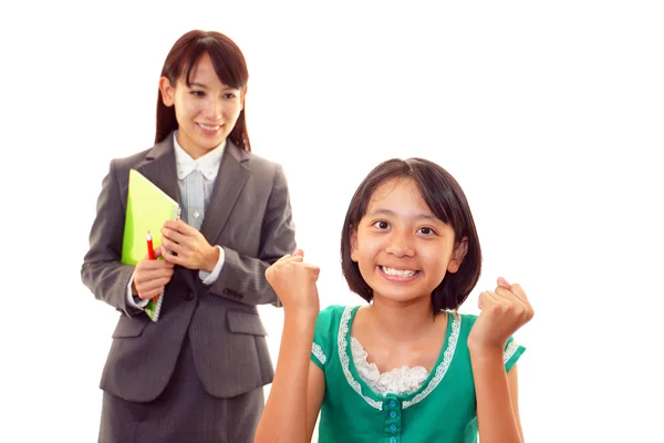 Menina sorridente com professor — Fotografia de Stock