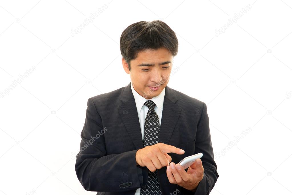 Mobile phone and business man