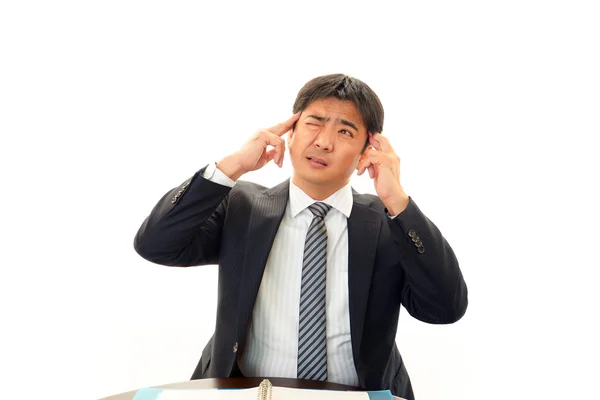 Businessman having a headache — Stock Photo, Image