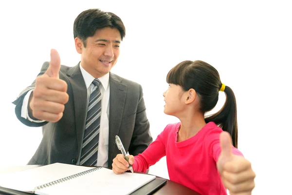 Teacher with girl studying. — Stock Photo, Image