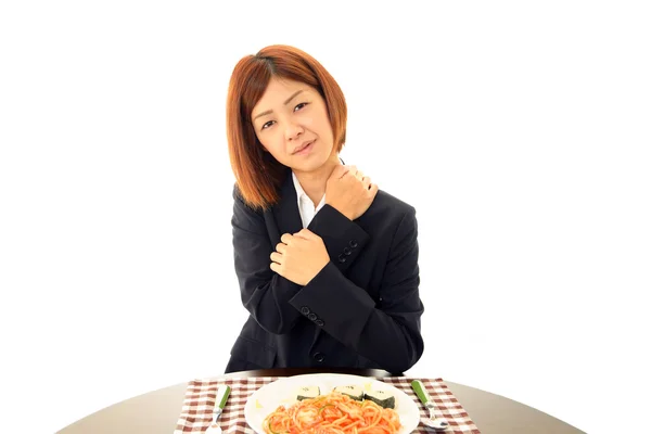 Businesswoman eating meals — Stock Photo, Image