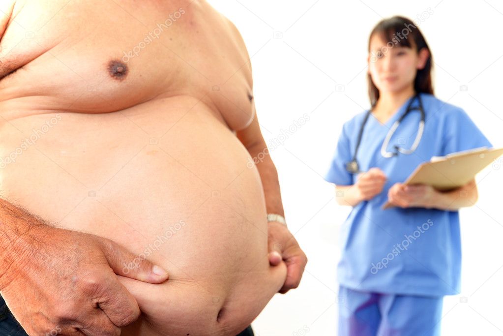 Serious doctor examining a patient obesity