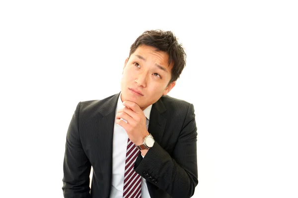 Gestresster asiatischer Geschäftsmann — Stockfoto