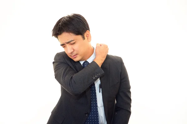 Businessman with shoulder pain. — Stock Photo, Image